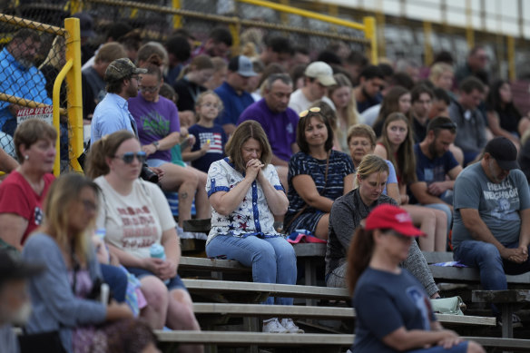 Mourners attend a candlelight vigil for Corey Comperatore at the Lernerville Speedway in Sarver, Pennsylvania.