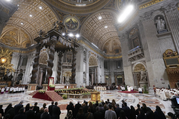 Faithful gather in St Peter’s Basilica to attend a mass for the Virgin Mary of Guadalupe at the Vatican.