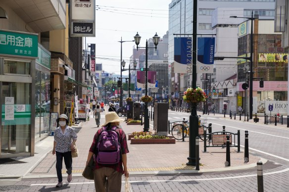 Fukushima’s main street on Wednesday as the Japanese softball team opens the Olympics. 