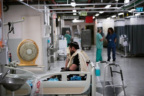 A patient prays at a protected underground facility at Ichilov Hospital in Tel Aviv, Israel, following an Iranian missile attack on Monday.