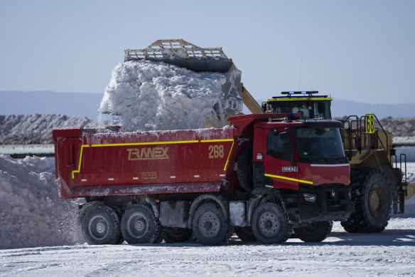 Salt, used as part of lithium processing, is dumped into a truck at the Albemarle lithium mine in Chile’s Atacama desert.