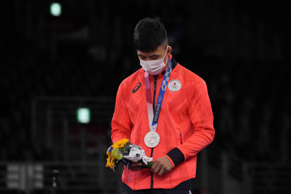 “Sorry”: Silver medallist, Japan’s Kenichiro Fumita on the podium during the medal ceremony for the men’s 60kg Greco-Roman wrestling n Tokyo on Monday.
