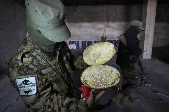 Captagon pills were hidden inside export products such as this melon, as well as pomegranates, machine parts and even doors.