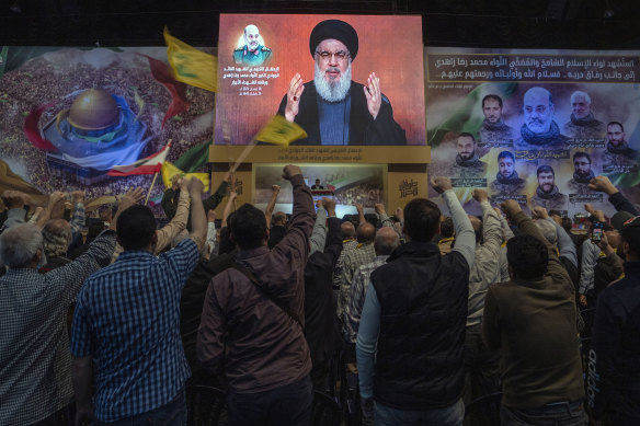 Hezbollah leader Sayyed Hassan Nasrallah speaks in a televised address via a video link during a ceremony to commemorate the death of several members of the Iranian Revolutionary Guards in April.