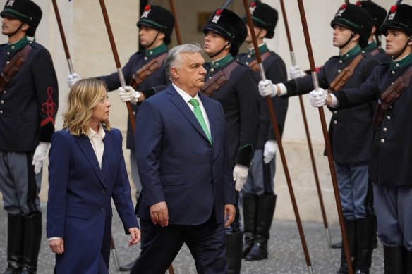 Italy’s Premier Giorgia Meloni welcomes her Hungarian counterpart Viktor Orban at the Chigi Palace government office in Rome in June.