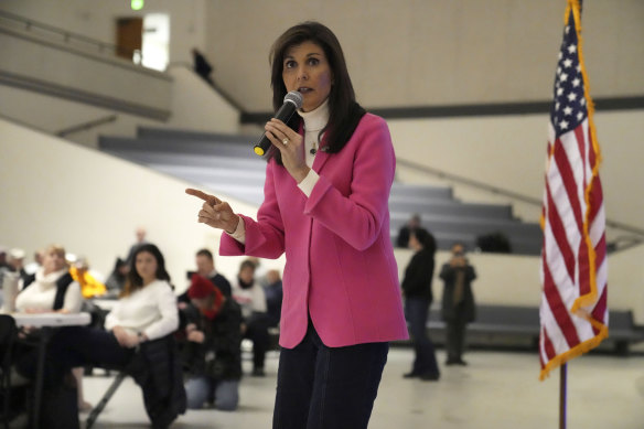 Nikki Haley gives a speech to caucus-goers at a caucus site in Des Moines, Iowa.