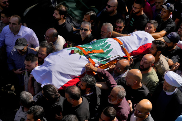Mourners carry Abdallah’s body during a funeral procession in his hometown of Khiam, southern Lebananon.