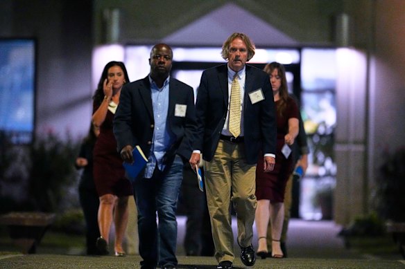 Media witnesses leave Riverbend Maximum Security Institution after the execution of Christa Pike was halted.