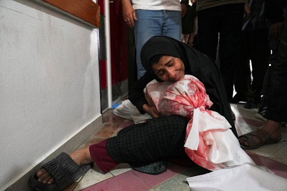 A Palestinian woman mourns her son, killed in an Israeli airstrike in Jabalia, northern Gaza Strip, on Wednesday. 