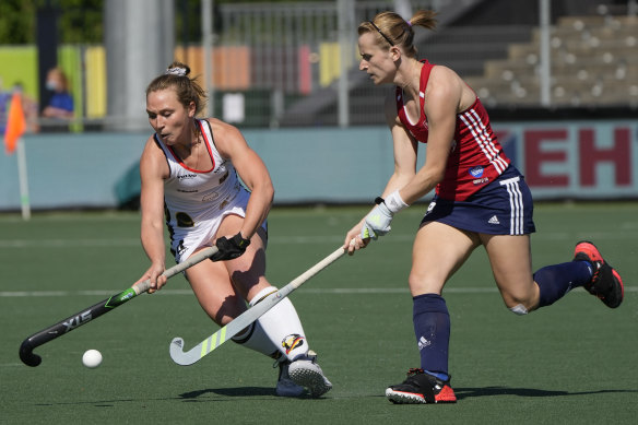 Germany’s Nike Lorenz, left, and England’s Elena Rayer vie for the ball during a match against England at the EuroHockey Championships 2021 in Amstelveen, Netherlands.