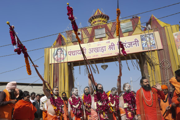 Brightly coloured structures mark the entrances to the camps of individual religious groups.