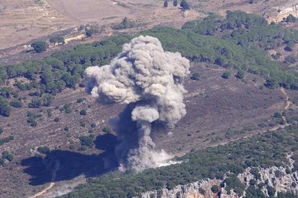 Smoke rises from an Israeli airstrike on the Mahmoudieh mountain, as seen from Marjayoun town, south Lebanon.