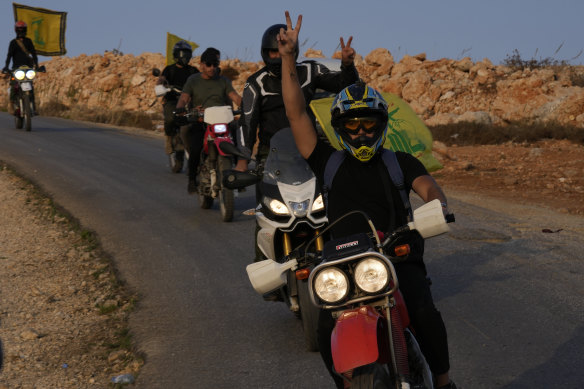 Hezbollah supporters on the Lebanese side of the Lebanese-Israeli border, near the Israeli town of Metula.