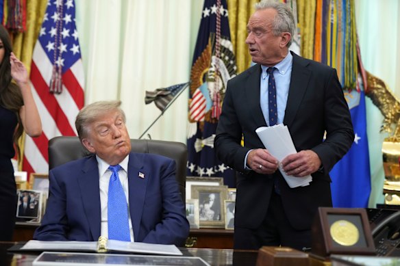 The executive order by Donald Trump, pictured with Health Secretary  Robert F. Kennedy Jr, may not have any legal power, but it normalises misinformation about vaccines.