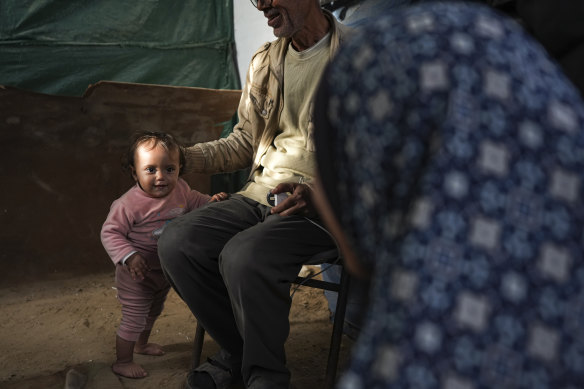 Fifteen-month-old Massa Zaqout in her family’s tent at a camp for displaced Palestinians in Deir al-Balah, central Gaza Strip on Tuesday.