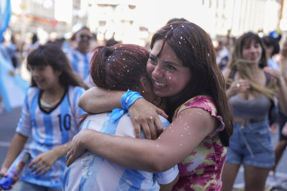 Argentine soccer fans celebrate their team’s World Cup victory over France, in Buenos Aires.