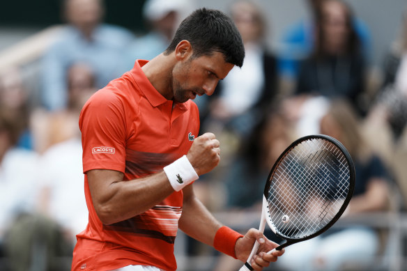 Serbia’s Novak Djokovic celebrates winning a point as he plays Slovenia’s Aljaz Bedene during their third round match of the French Open tennis tournament at the Roland Garros stadium Friday, May 27, 2022 in Paris. (AP Photo/Thibault Camus)