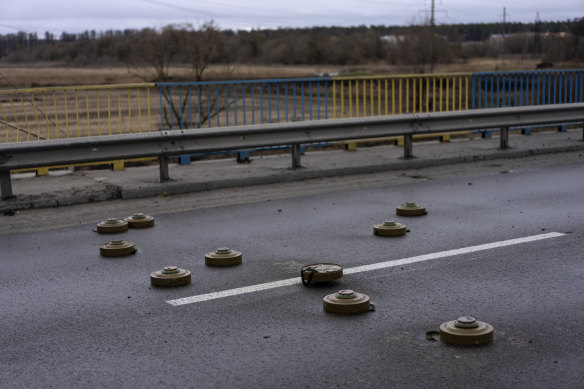 Anti-tank mines are spread out on a bridge in Bucha.
