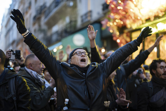 Protesters chant slogans in Paris.