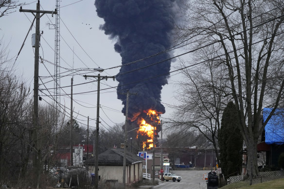 A black plume rises over East Palestine, Ohio.