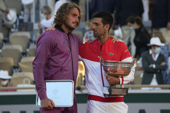 Novak Djokovic ,right, and Stefanos Tsitsipas after the 2021 French Open final.