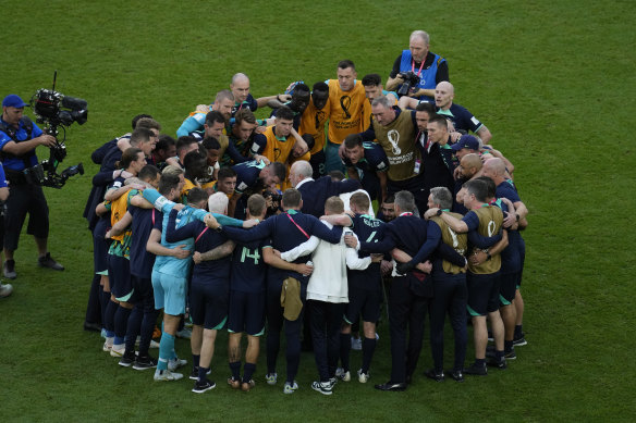 A group hug for the Socceroos and for the nation.