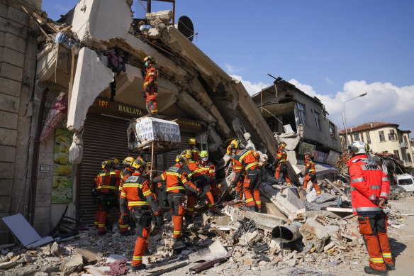 Rescue workers from Hong Kong search for survivors of the earthquake, in Antakya, Turkey on Saturday.
