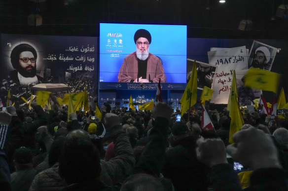 Hezbollah leader Sheik Hassan Nasrallah addresses supporters via video in Beirut, Lebanon, on Wednesday. 