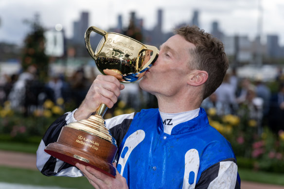 Mark Zahra celebrates in the mounting yard after his win.