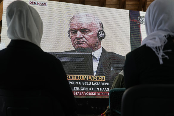 Women from Srebrenica watch a live broadcast from the Yugoslav War Crimes Tribunal in The Hague.