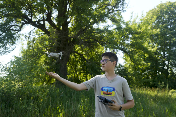 Andriy Pokrasa, 15, lands his drone on his hand. Andriy is being hailed in Ukraine for stealthy aerial reconnaissance work he has done with his dad in the ongoing war with Russia.
