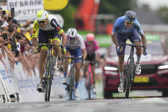 Stage winner Australia’s Simon Clarke, right, sprints towards the finish line ahead of Netherlands’ Taco van der Hoorn.