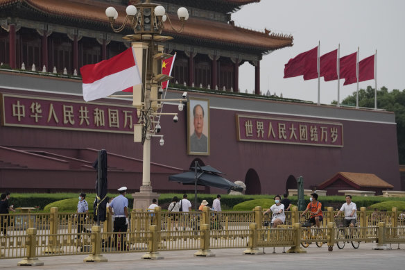 The Indonesian and Chinese national flags are flown together near Mao Zedong’s portrait on Tiananmen Gate in Beijing on Monday.