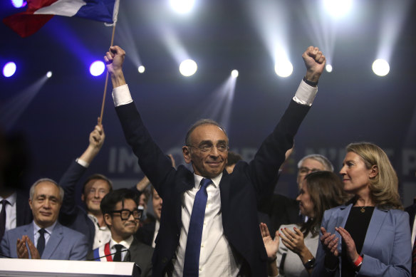 French far-right presidential candidate Eric Zemmour, waves after his first rally which was marked by violence.