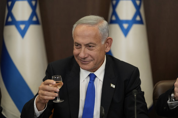 Newly sworn in Israeli Prime Minister Benjamin Netanyahu makes a toast during a cabinet meeting in Jerusalem last week.