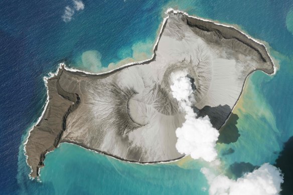 A an island created by the underwater Hunga Tonga Hunga Ha’apai volcano is seen smoking on January 7.