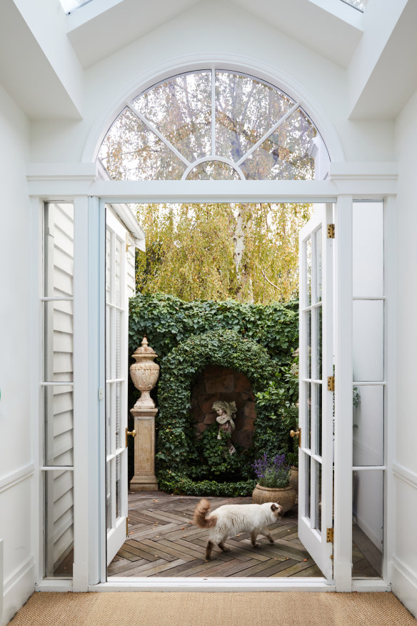 “The grotto was one of the original features of the home, and we enhanced the area by building a parquetry deck off the conservatory,” says Monique.