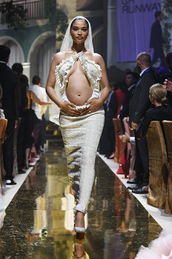 Shaik walked the runway pregnant at this year’s amfAR Cannes Gala.