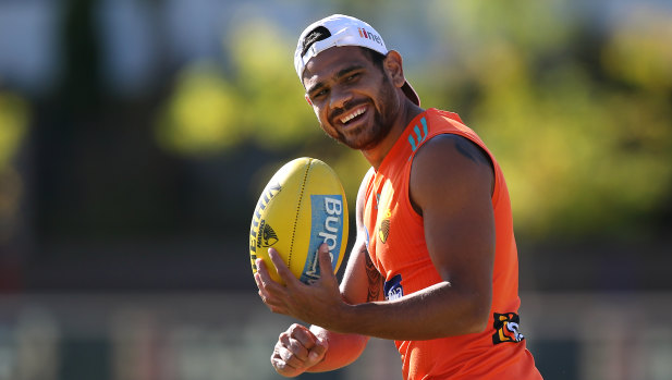 Cyril Rioli is all smiles at training on Friday.