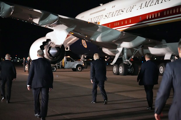 Donald Trump returned to Washington on his new plane after making a switch in the UK.