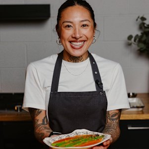 Nat Thaipun prepares asparagus with Panang curry butter sauce.