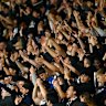 Victory fans chant before the A-League grand final.