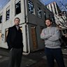 Tim Staindl and Duncan Wallace outside the Corkman pub rebuild in Carlton.