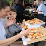 Customers enjoying the Neapolitan-style pizza at Tutto Vero in Oatley.