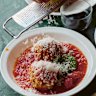 A dollop of basil pesto adds piquancy to this classic meatball dish.