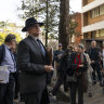 Conciliation meeting: Residents and owners gathering with Land and Environment Court Commissioner Peter Walsh outside 10 Onslow Avenue in Sydney’s Elizabeth Bay on Wednesday morning.