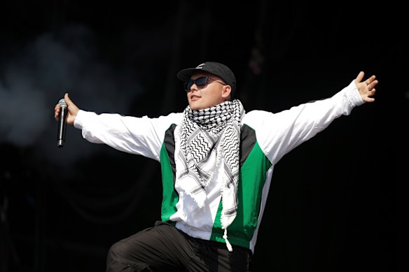 Mo Chara of Kneecap performs at the Glastonbury music festival. The band’s set is now under police investigation.