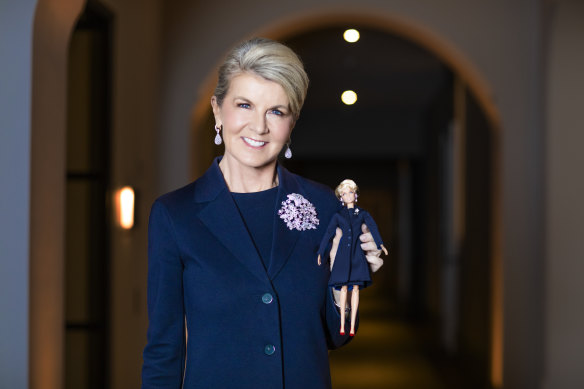 Julie Bishop with her Barbie doll, whose outfit is modelled on her dress from the day she quit politics.