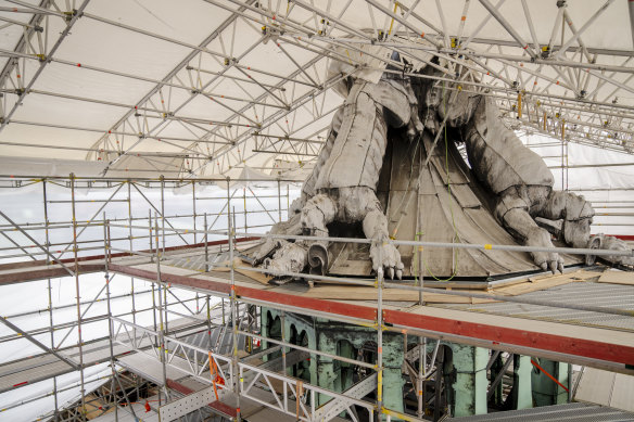 The dragon spire on the roof of the Stock Exchange under renovation before the fire.