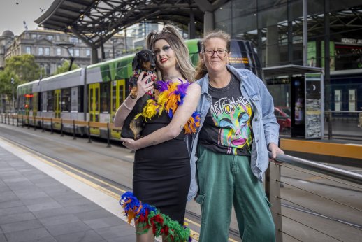 Imogen Johnson, mother Di and dachshund Sizzle at Southern Cross waiting for a tram to Pride March in St Kilda.